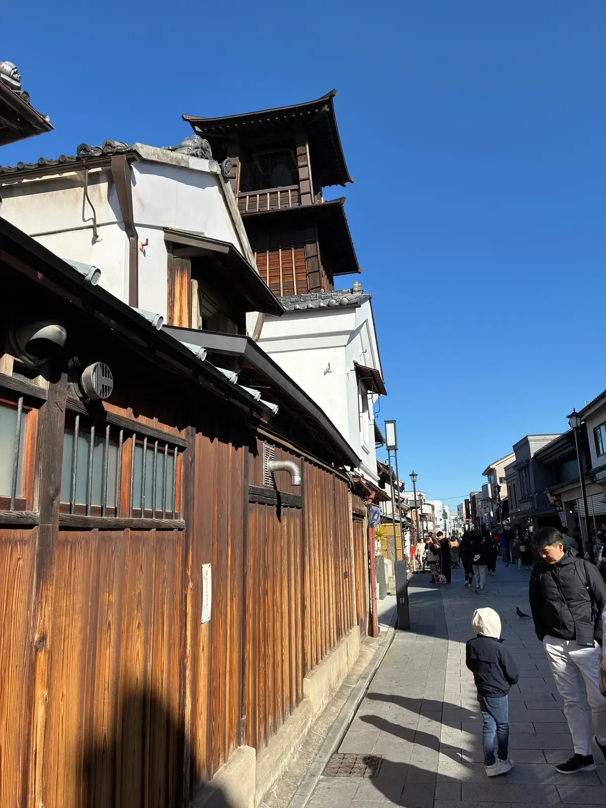 The Toki no Kane bell tower above the warehouse street in Kawagoe on a day trip from Tokyo