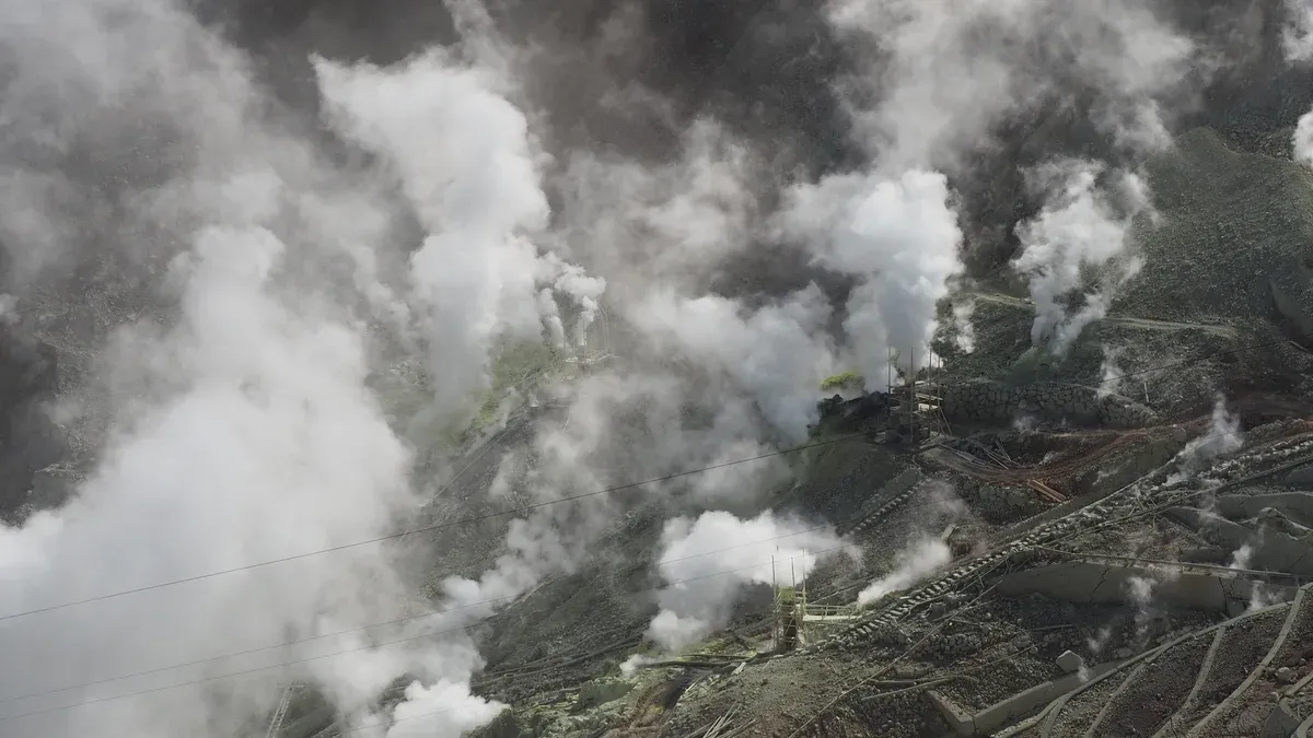 Steam rising from the Owakudani volcanic valley in Hakone on a Mt Fuji and Hakone day tour from Tokyo