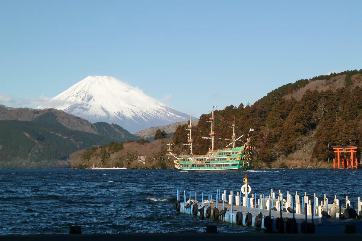 Mt Fuji and a sightseeing ship on Lake Ashi during a Fuji and Hakone day tour from Tokyo