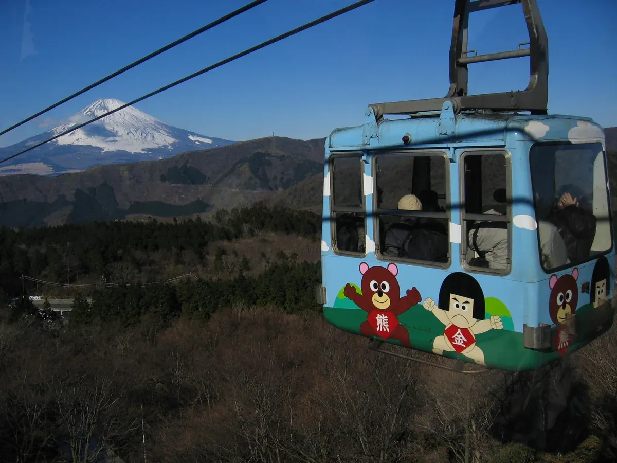 Hakone Ropeway gondola with Mt Fuji behind, a stop on the Hakone Free Pass day trip from Tokyo